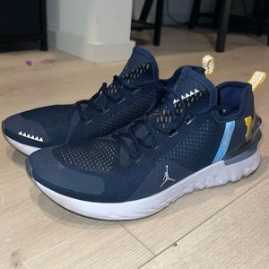 Michigan player issued training shoes size 12 (C. Macnamara)
